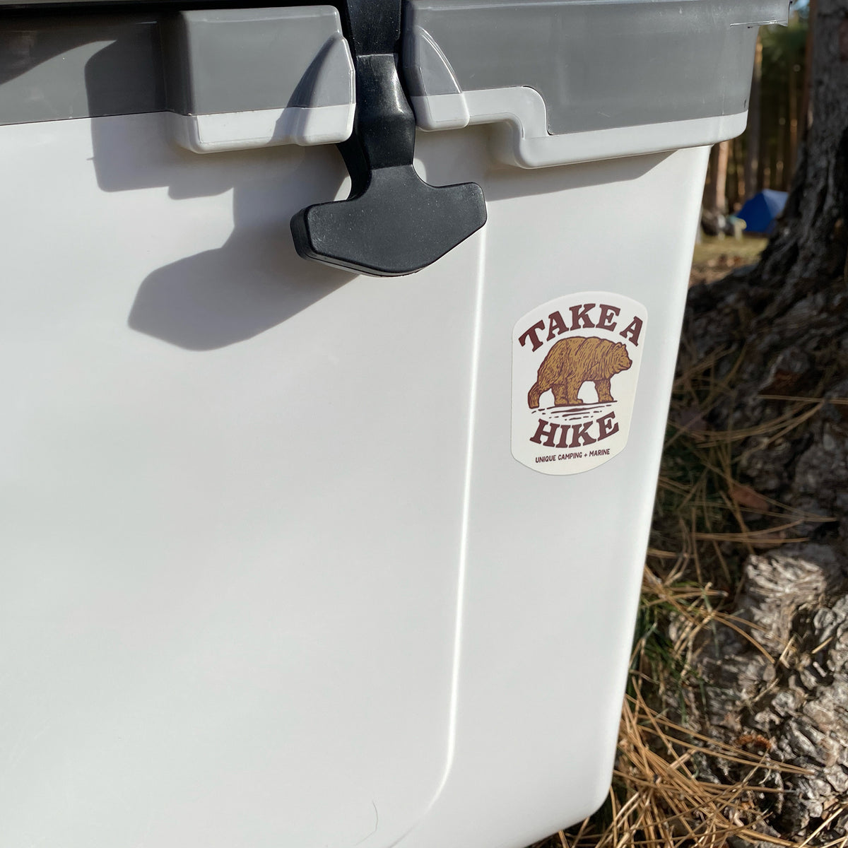 Take a hike sticker on a cooler. Unique Camping + Marine
